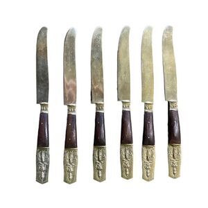 Set of vintage Siam brass and wood butter knives